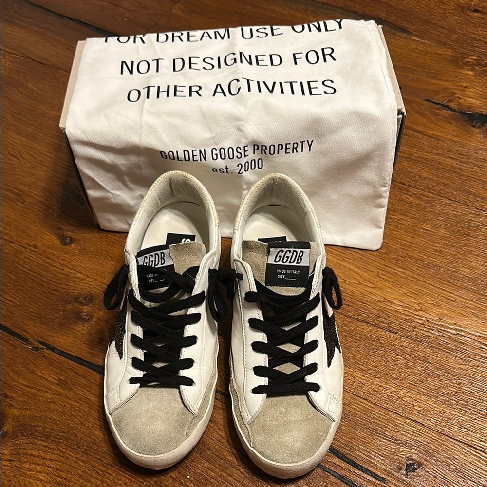 Golden Goose Black and White Distressed Sneakers like new